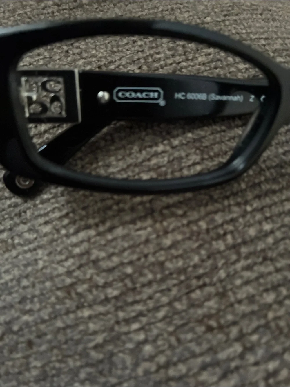 Coach sleek black